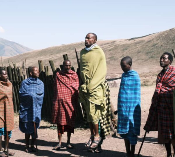 The Maasai tribe, an iconic ethnic group in East Africa, can be experienced in and around the Ngorongoro Crater area in Tanzania. The Maasai are known for their distinctive culture, colorful attire, and traditional lifestyle.