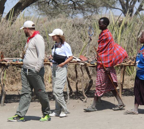 Kale Voyage clients visiting a Maasai boma in Ngorongoro.